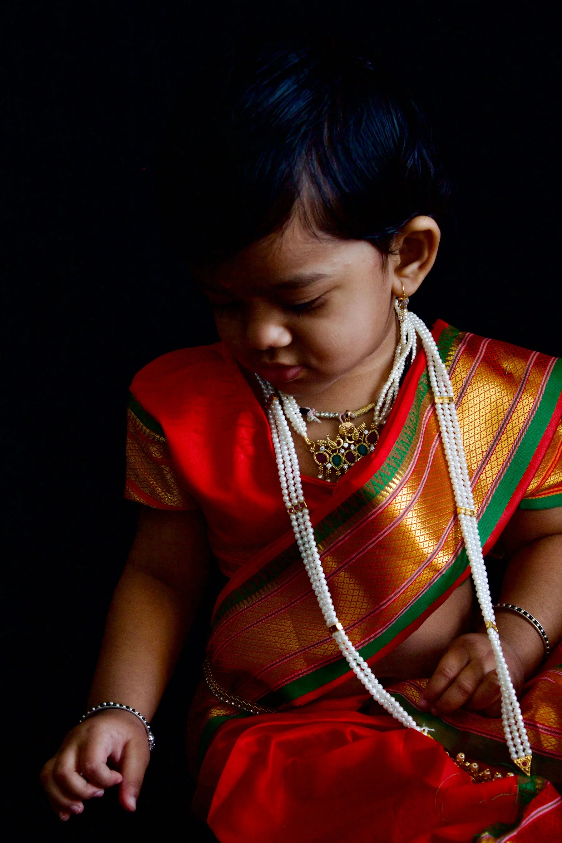 Young child in traditional festive clothing