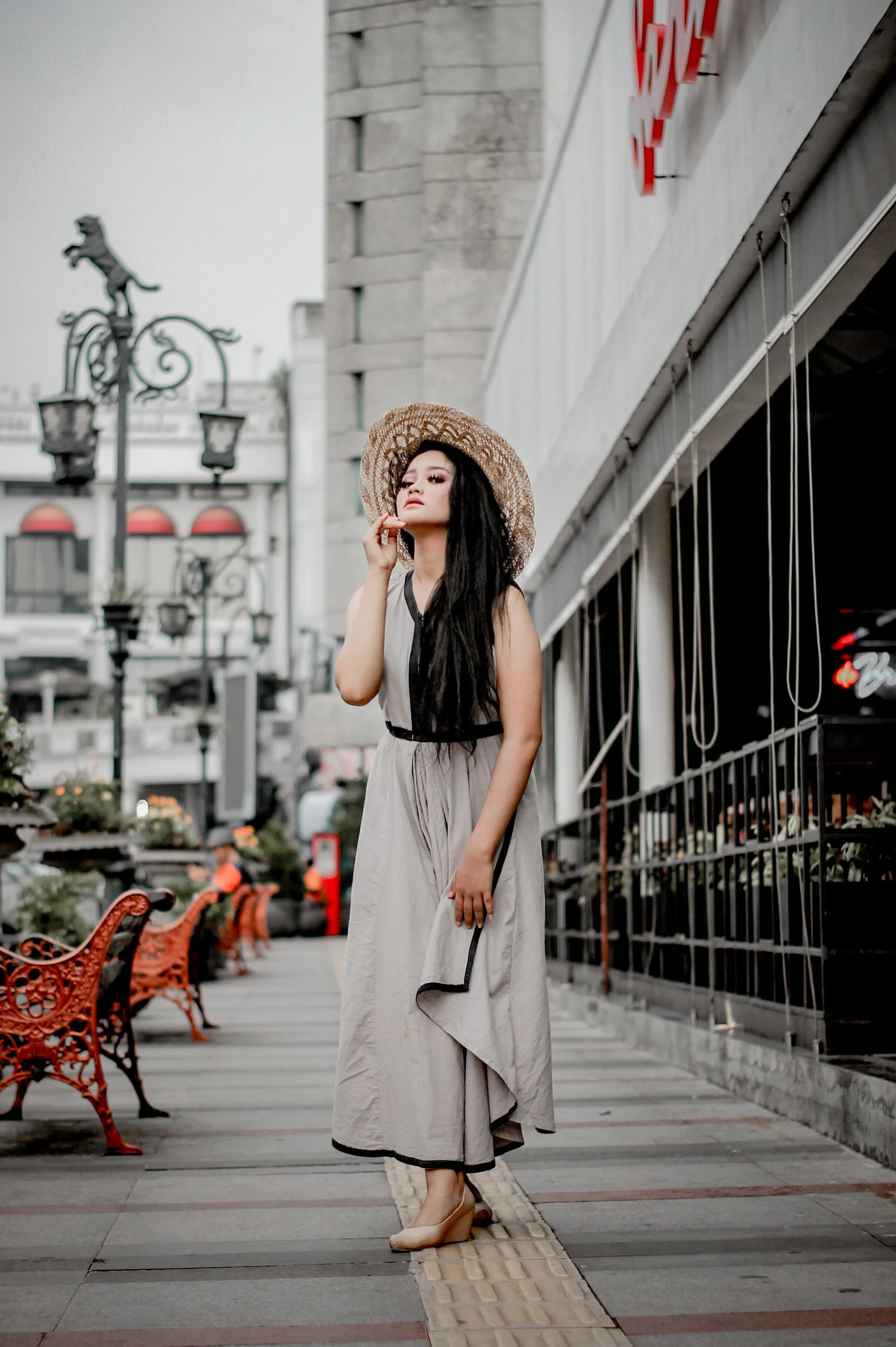 Woman wearing a contemporary western dress in an urban setting